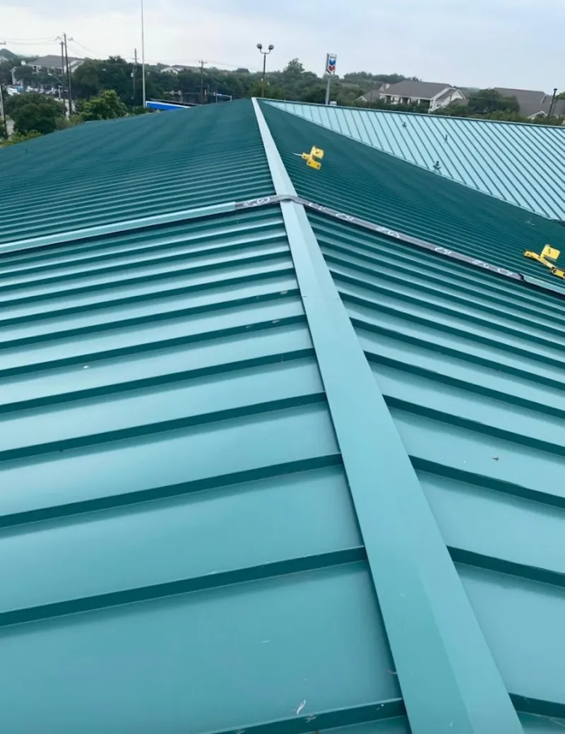 Green commercial metal roof ridge and valley for Metal Roof Repair in Lynden